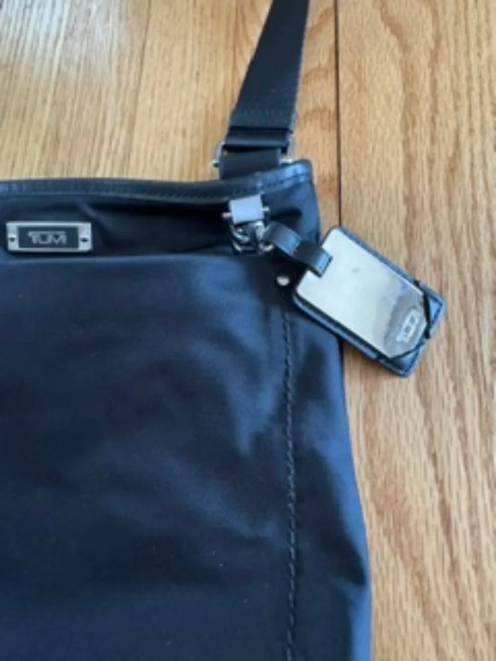 Tumi cross body bag